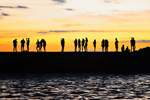a sunset over a body of water