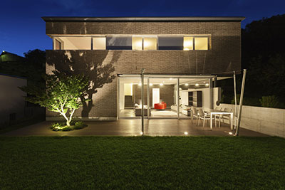 a building with grass and trees